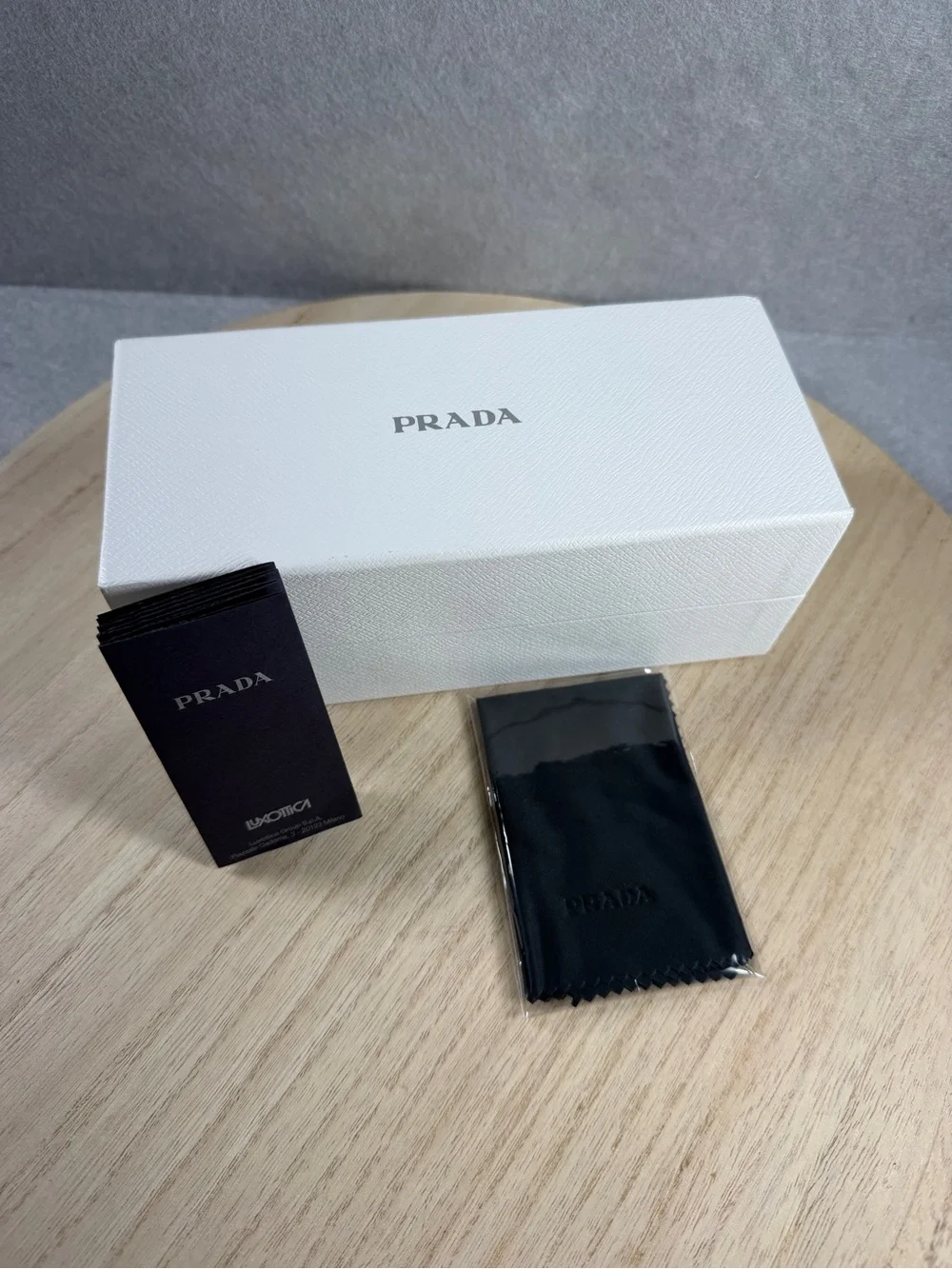 Prada White Presentation Box with Black Microfiber Cloth and Booklet